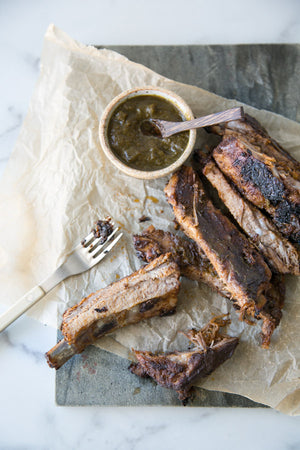 These easy oven baked ribs start with a store bought gluten-free BBQ sauce, but get leveled up by three key ingredients: green chile, cilantro and ginger.