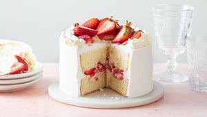 Berries and cream have never tasted better than when paired with fluffy vanilla cake layers