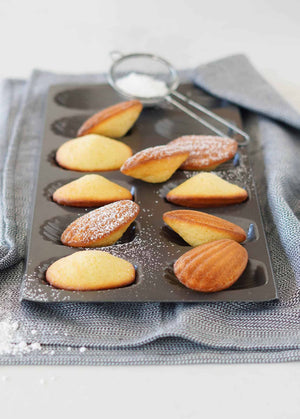 Tasting a classic madeleine right as it comes out of the oven is an unforgettable experience